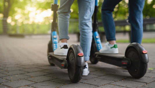 What is the true cost of buying an electric scooter versus a car?